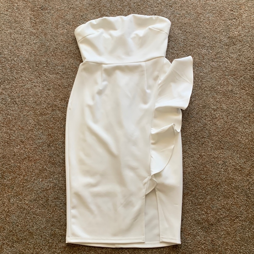 White, fitted, strapless dress. Bride rehearsal dress.